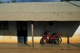 Comoros-Archipelago;-Corrugated-iron;-France;-House;-Housing;-Indian-Ocean;-Kaleidos;-Kaleidos-images;-La-parole-à-limage;-Laurent-Abad;-Light;-Mayotte;-Moped;-Stories-Pictures;-Two-wheeler